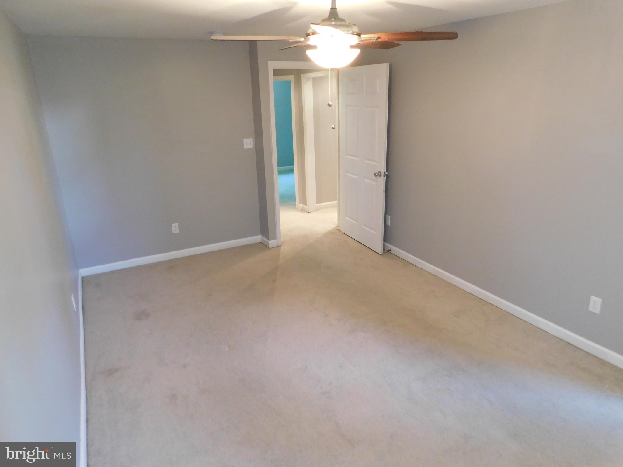 7009 Fieldcrest Road Baltimore, MD 21215 - Photo 27 of 46 an empty room with a bathroom