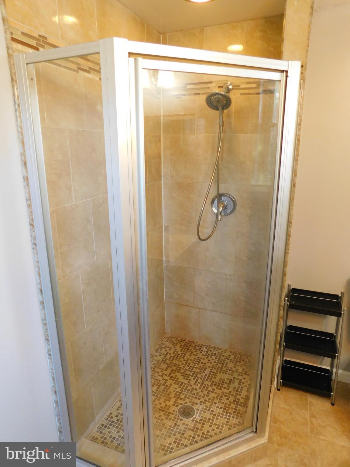 7009 Fieldcrest Road Baltimore, MD 21215 - Photo 31 of 46 a bathroom with a shower