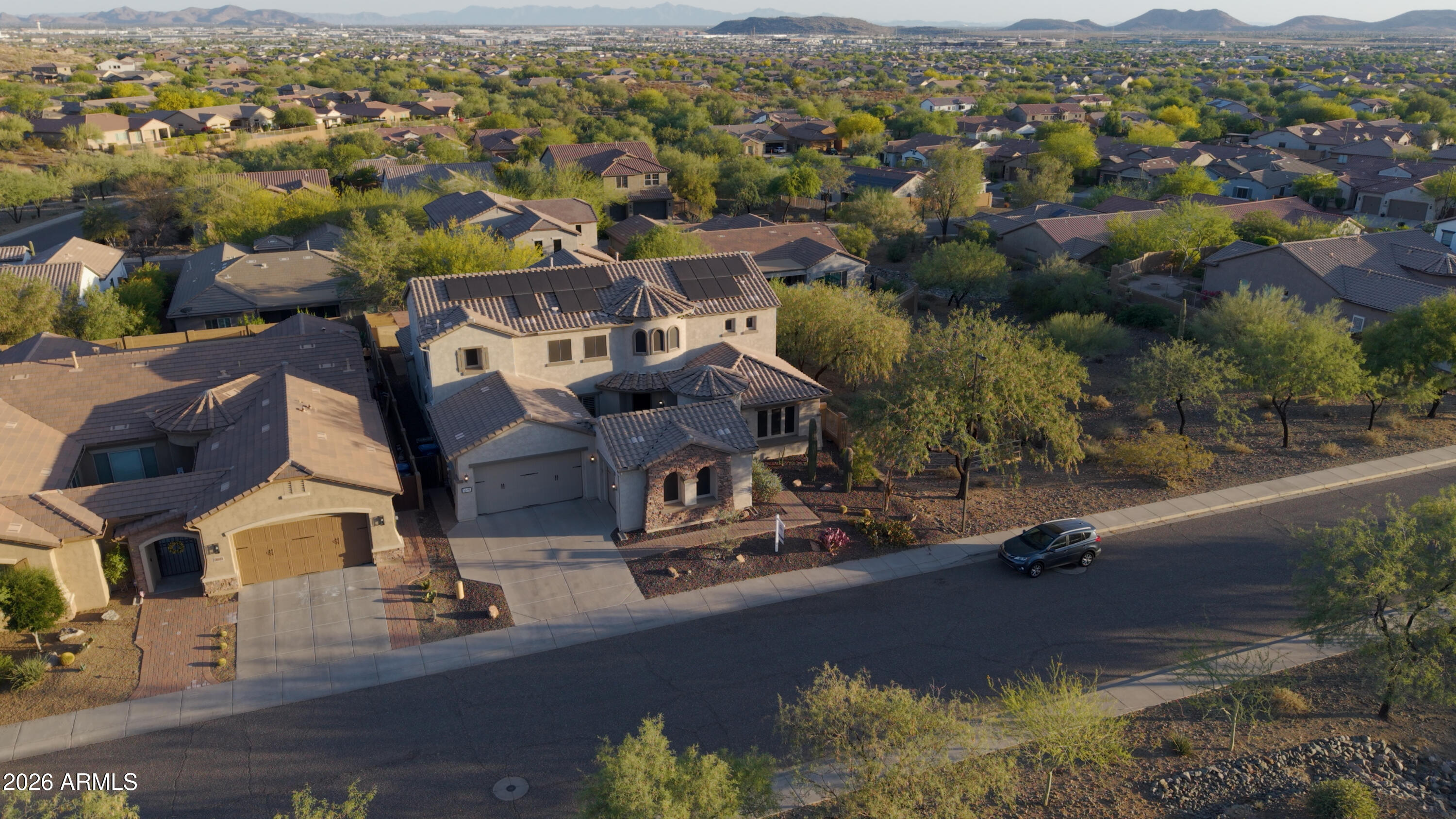 1615 West Red Fox Road Phoenix, AZ 85085 - Photo 63 of 64 an aerial view of residential houses with outdoor space