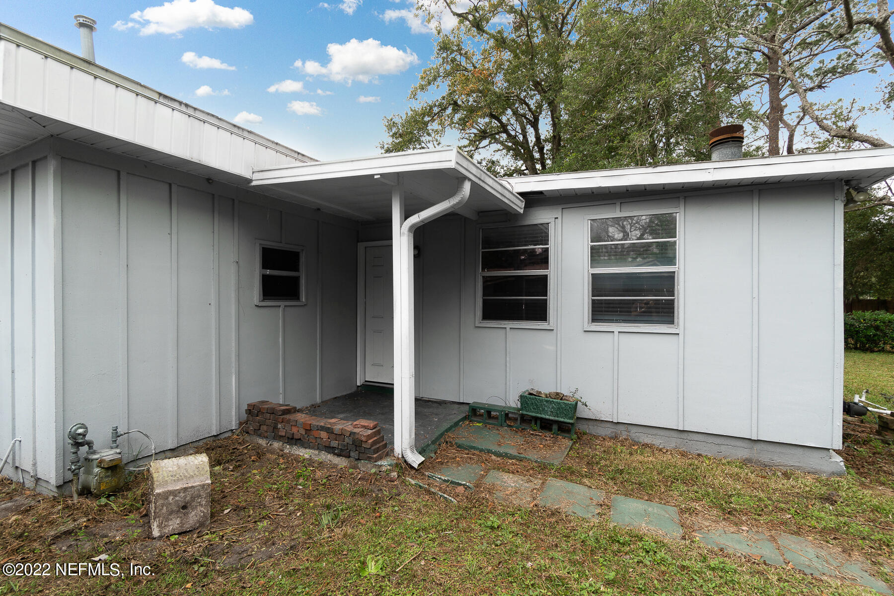 7403 Proxima Road Jacksonville, FL 32210 - Photo 26 of 30 a view of a house with a fence