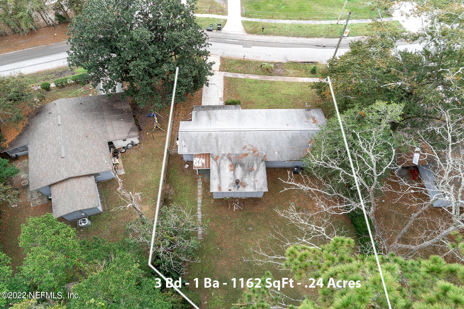 7403 Proxima Road Jacksonville, FL 32210 - Photo 29 of 30 an aerial view of a house with a yard