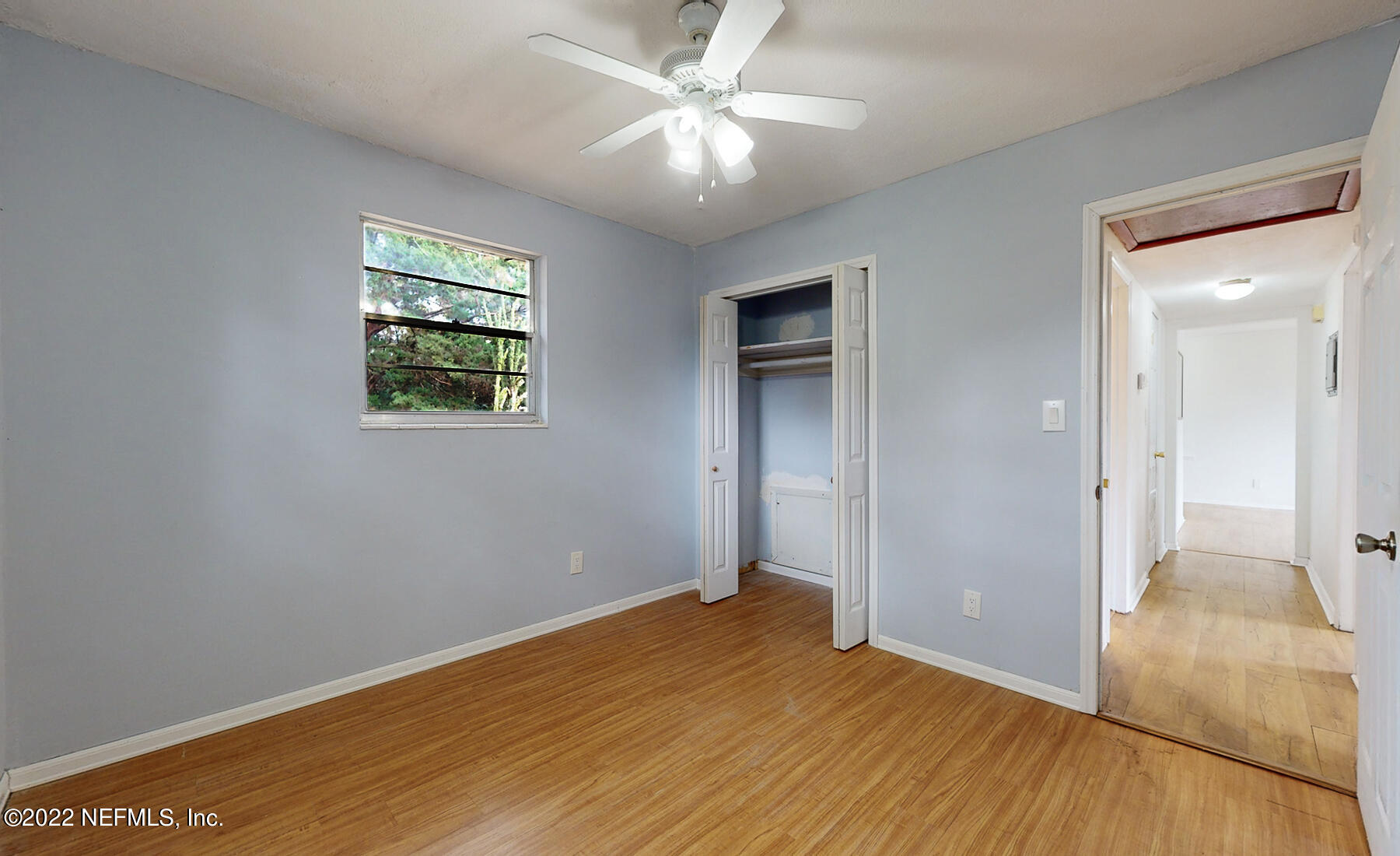 7403 Proxima Road Jacksonville, FL 32210 - Photo 10 of 30 wooden floor in an empty room