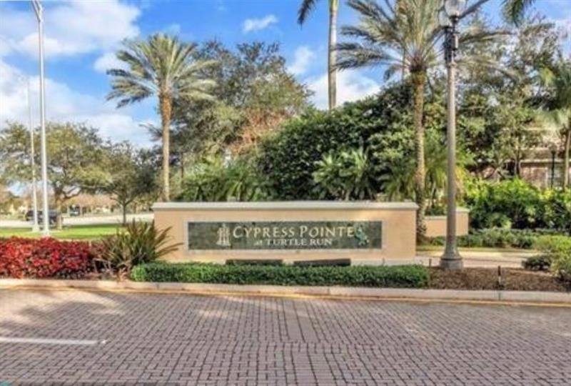 6540 West Sample Road, Unit 6540 Coral Springs, FL 33067 - Photo 2 of 23 Cypress pointe sign