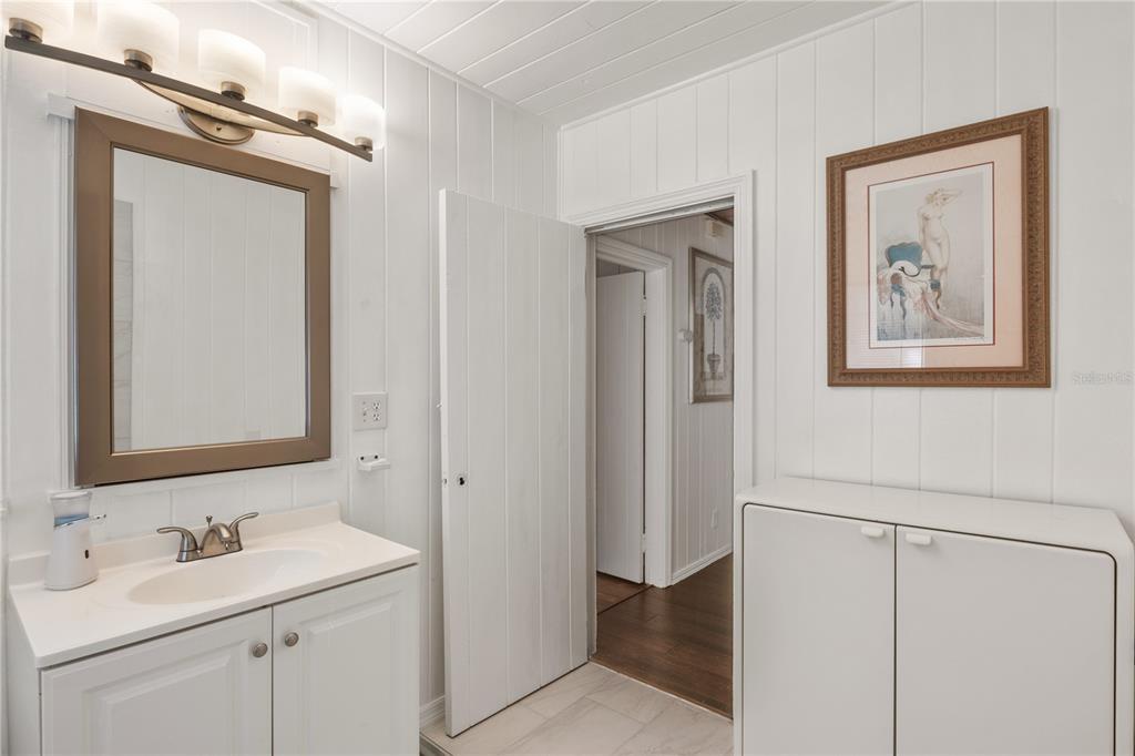 1270 5th Street Sarasota, FL 34236 - Photo 17 of 29 a bathroom with a sink and a mirror