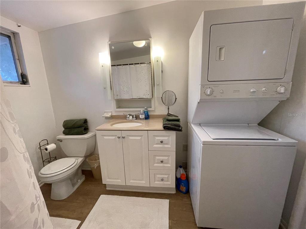 1270 5th Street Sarasota, FL 34236 - Photo 26 of 29 a bathroom with a toilet sink and mirror