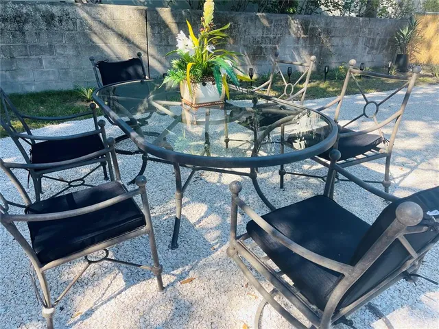 a view of an outdoor sitting area with chairs