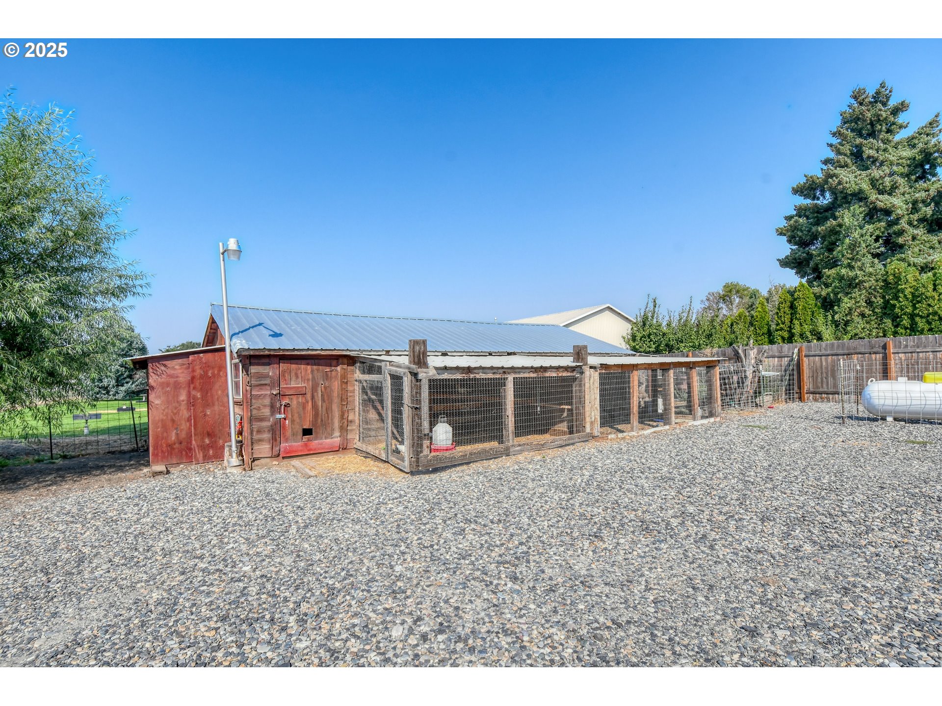 256 Northwest Jewell Court Irrigon, OR 97844 - Photo 35 of 47 an outdoor space with wooden fence