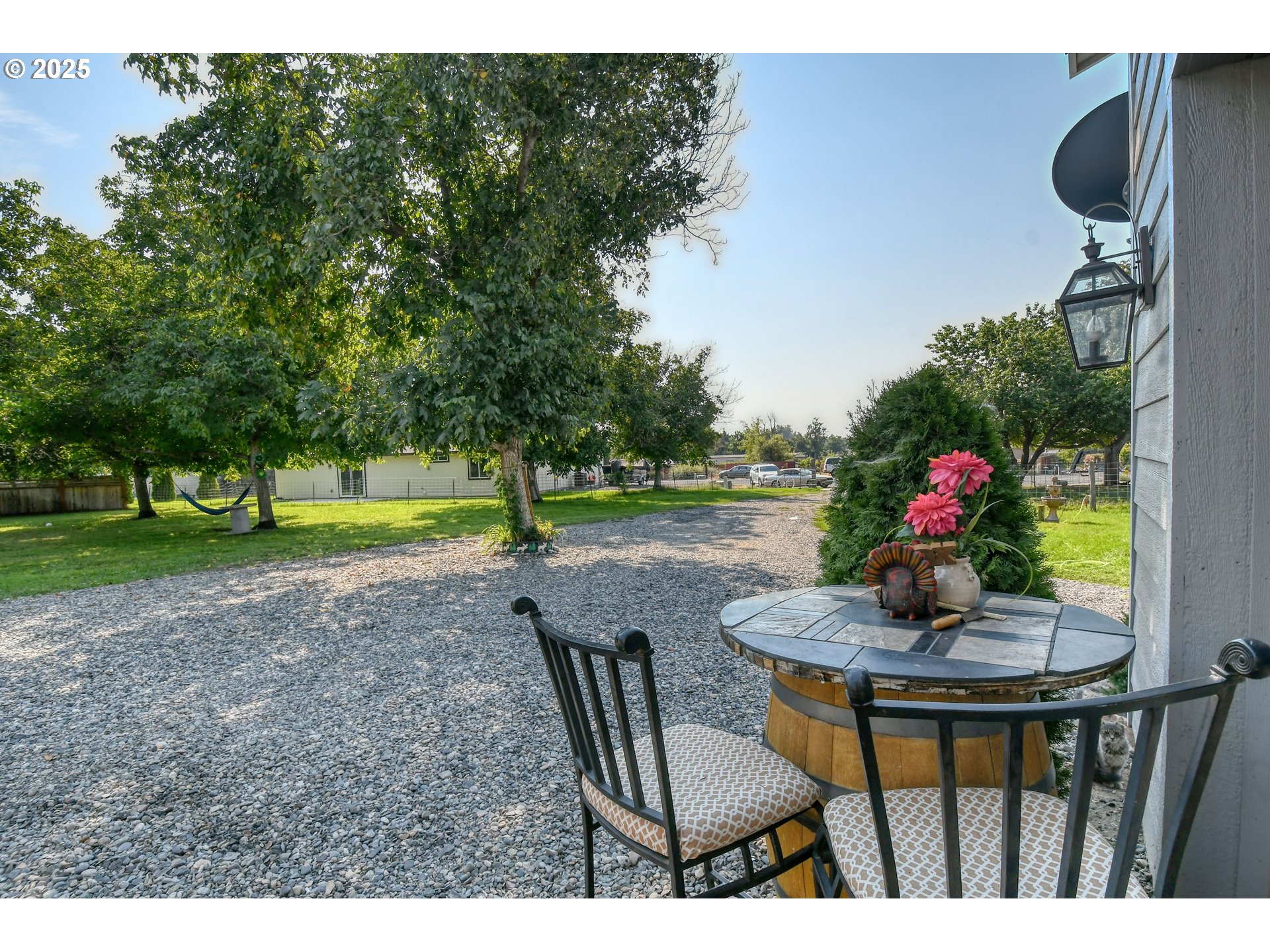 256 Northwest Jewell Court Irrigon, OR 97844 - Photo 44 of 47 a view of a porch with furniture and garden