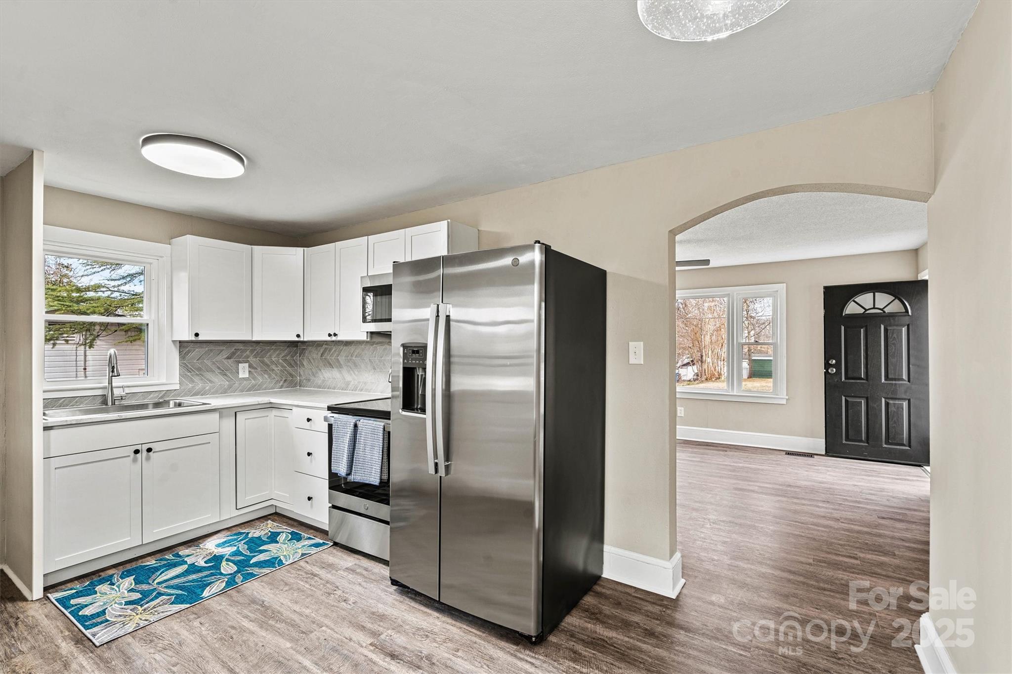 2829 1st Avenue Northwest Hickory, NC 28601 - Photo 1 of 22 a kitchen with stainless steel appliances granite countertop a refrigerator and a sink
