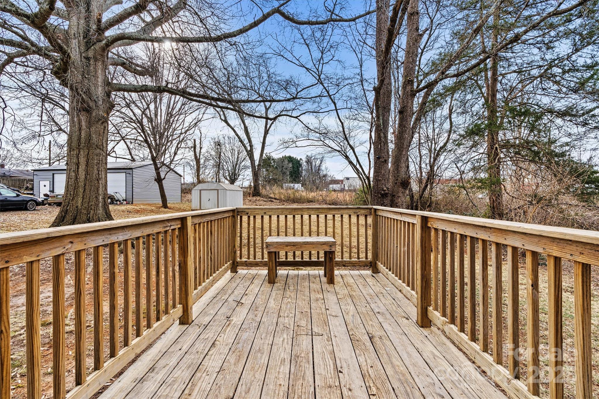 2829 1st Avenue Northwest Hickory, NC 28601 - Photo 19 of 22 a view of balcony with wooden floor and fence