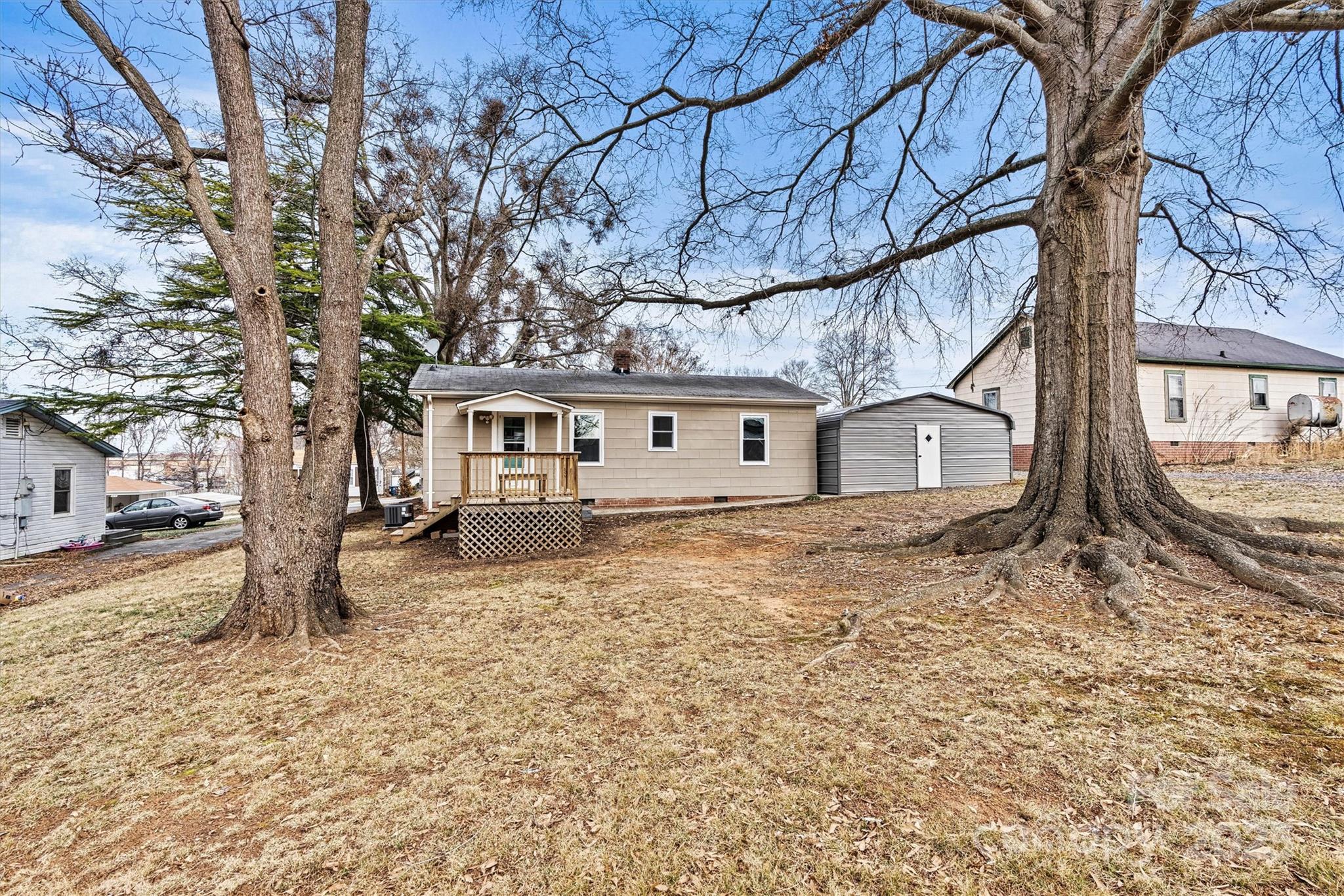 2829 1st Avenue Northwest Hickory, NC 28601 - Photo 20 of 22 a house with trees in front of it
