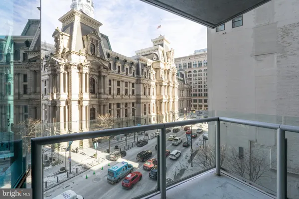 a view of a balcony with city view