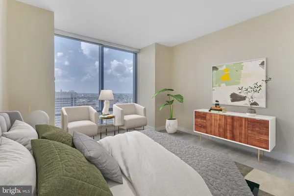 a living room with furniture and window
