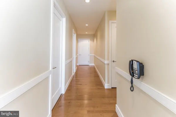 a view of storage and utility room with washer and dryer