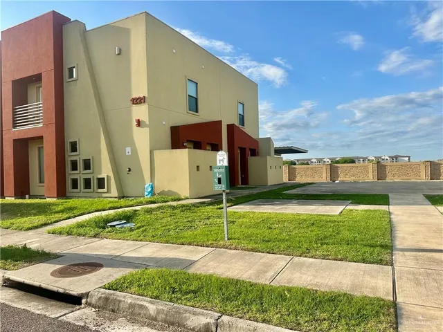 a view of a back yard of the house