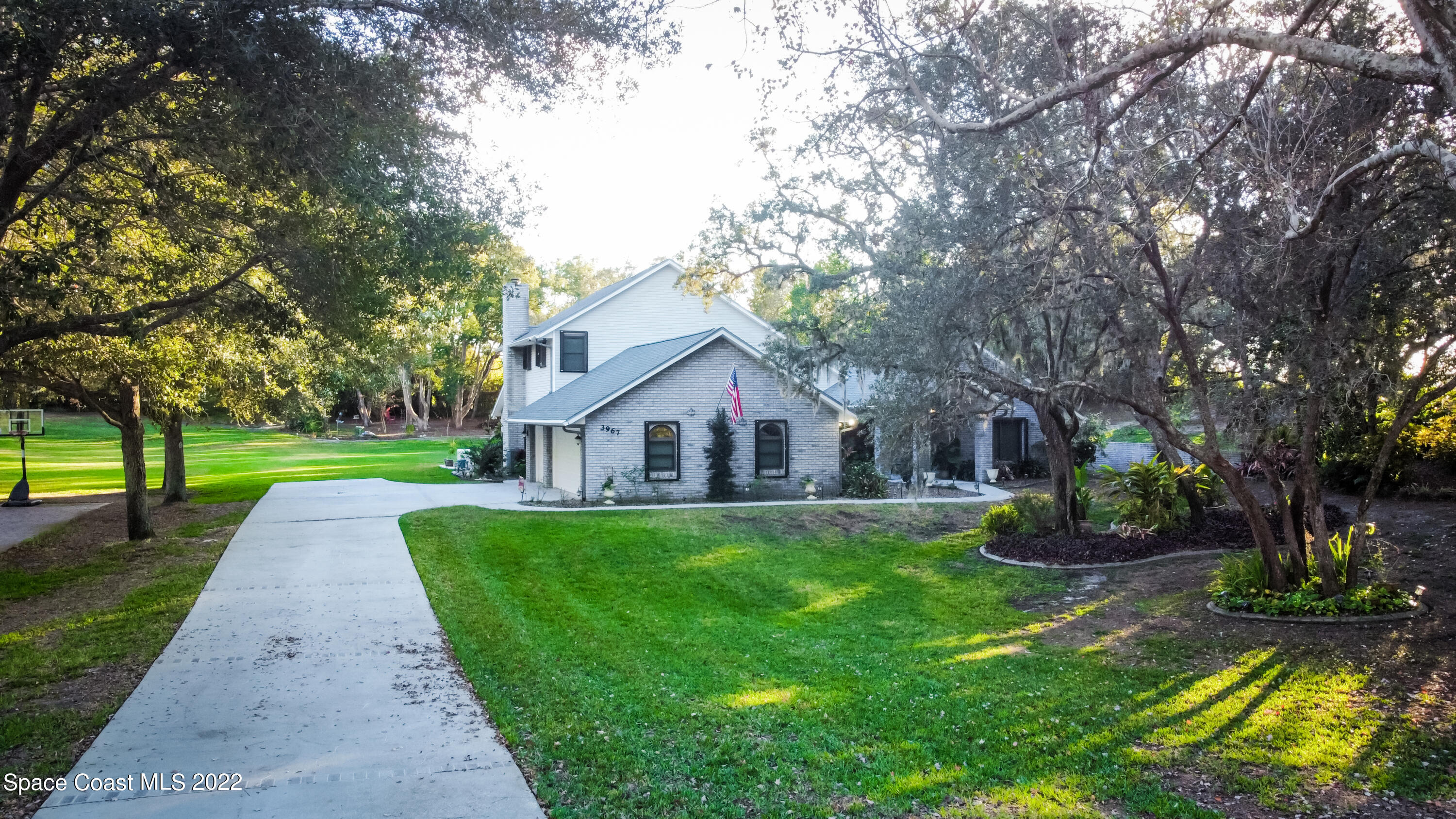 3967 Hunters Ridge Way Titusville, FL 32796 - Photo 3 of 39 Driveway