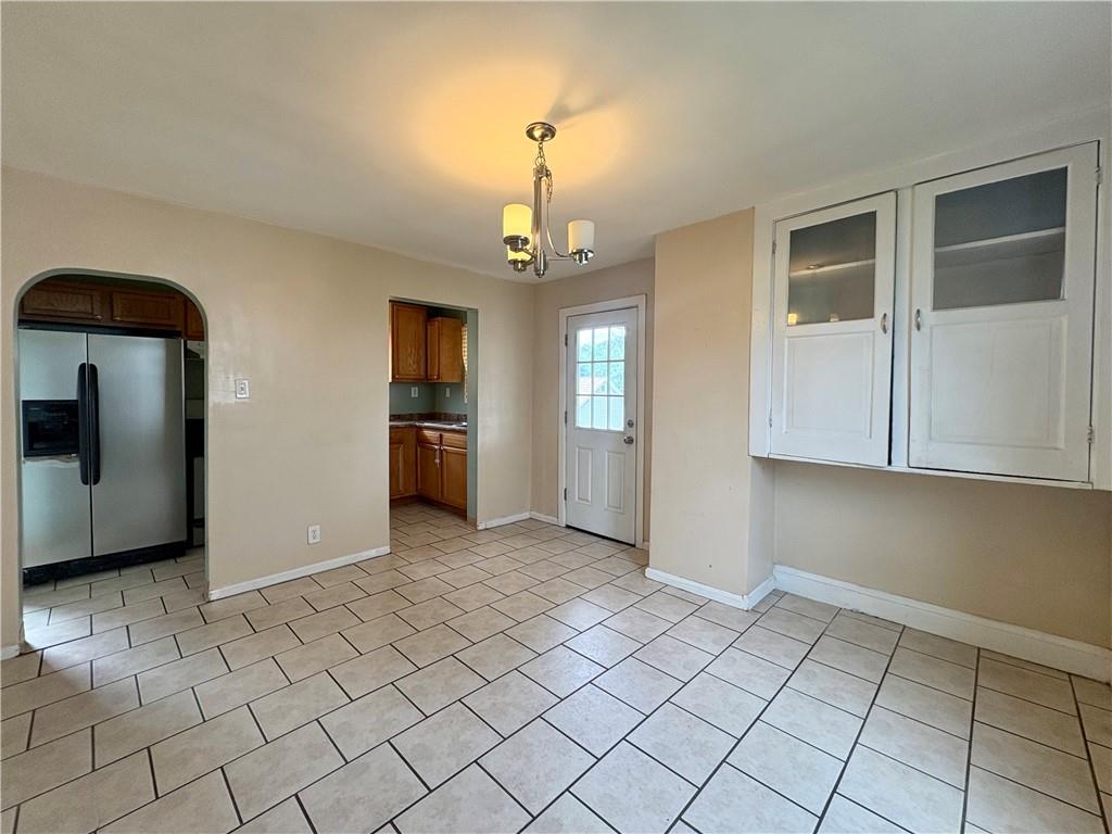 442 Park Street Rochester, PA 15074 - Photo 12 of 31 a view of an empty room with window and wooden floor