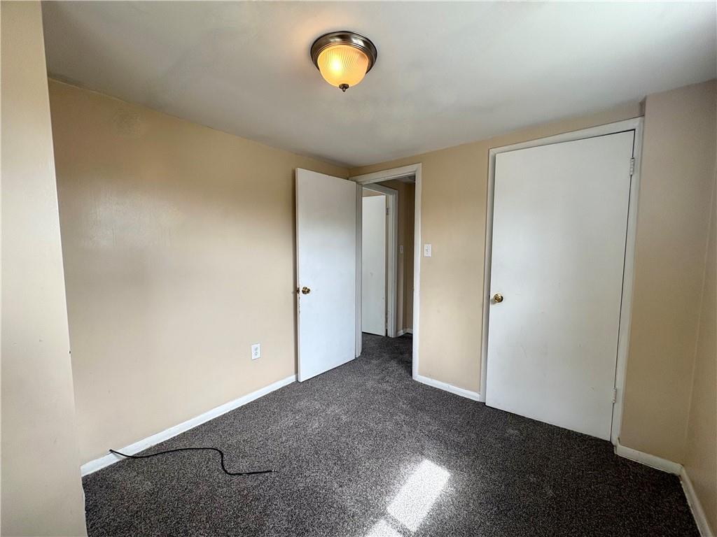 442 Park Street Rochester, PA 15074 - Photo 22 of 31 an empty room with windows and closet