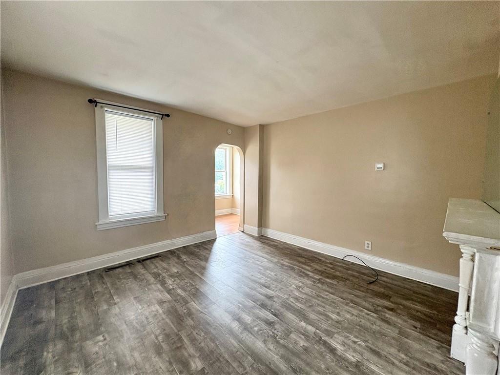 442 Park Street Rochester, PA 15074 - Photo 5 of 31 wooden floor in an empty room with a window