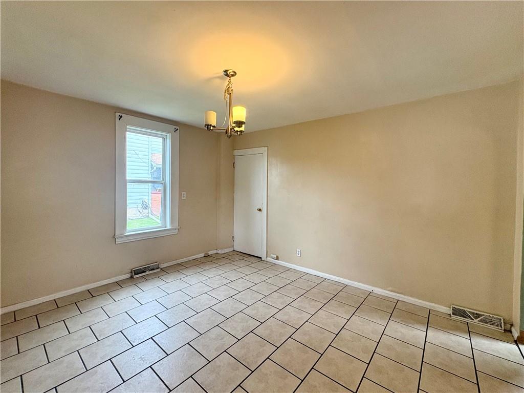 442 Park Street Rochester, PA 15074 - Photo 10 of 31 a view of an empty room and window