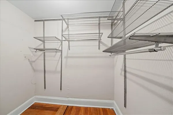 a view of a room with racks on the wall