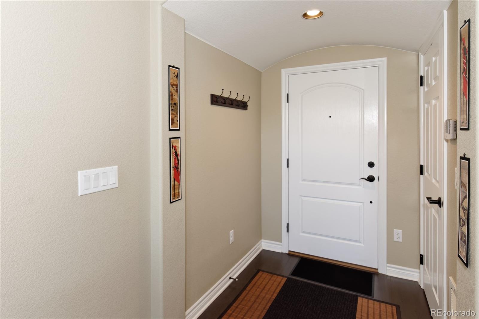 9278 Viaggio Way Highlands Ranch, CO 80126 - Photo 3 of 35 a view of walk in closet