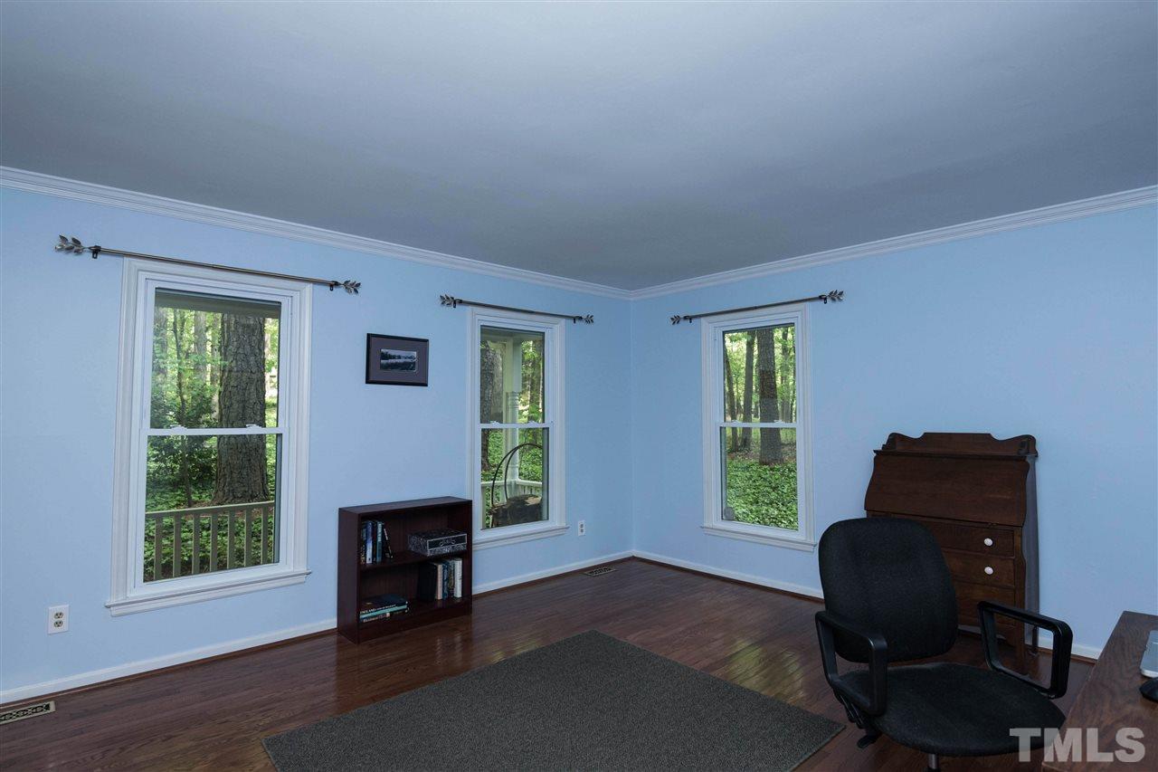 9609 Rock Creek Road Raleigh, NC 27613 - Photo 12 of 25 Living Room is currently being used as an office.
