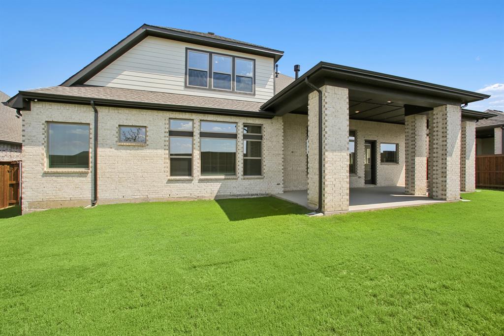 605 Derby Drive Mansfield, TX 76063 - Photo 3 of 13 a front view of a house with a yard