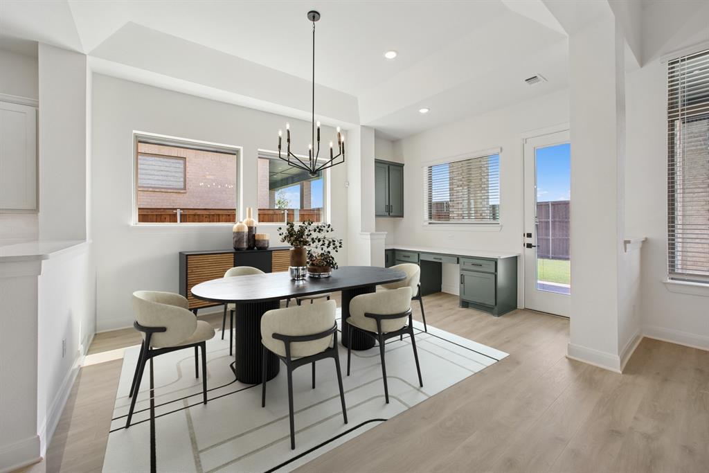 605 Derby Drive Mansfield, TX 76063 - Photo 7 of 13 a view of a dining room with furniture window and wooden floor
