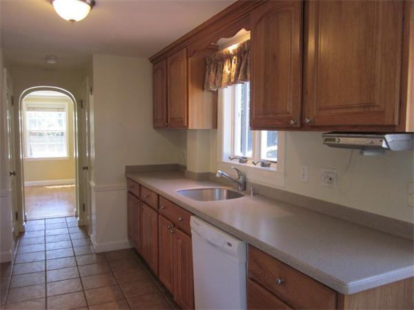 175 Broad Meadow Road Needham, MA 02492 - Photo 8 of 11 a kitchen with a sink and a window