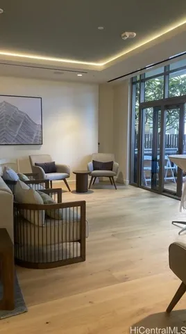 a view of a backyard with sitting area