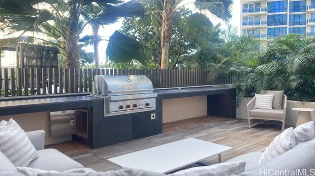 a view of a backyard with furniture