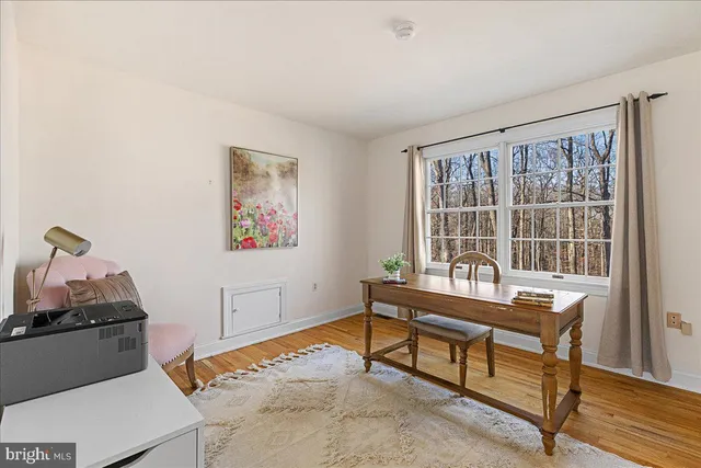 a room with furniture and a window