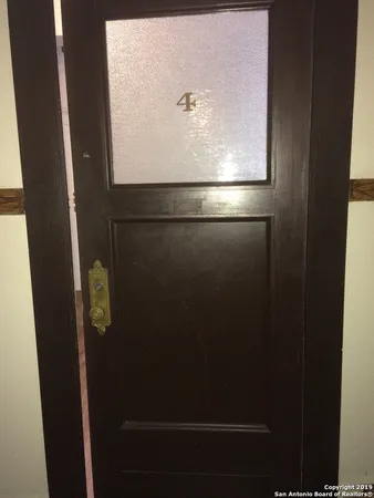 a bathroom with a toilet and a sink