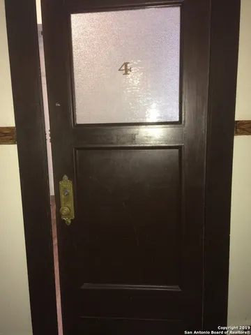 a bathroom with a toilet and a sink