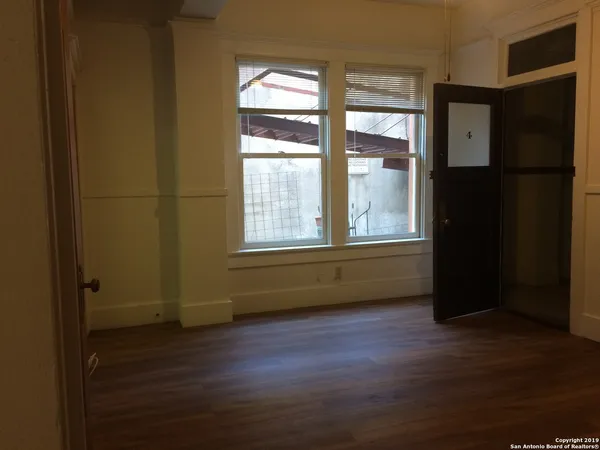 a kitchen that has a sink and a stove