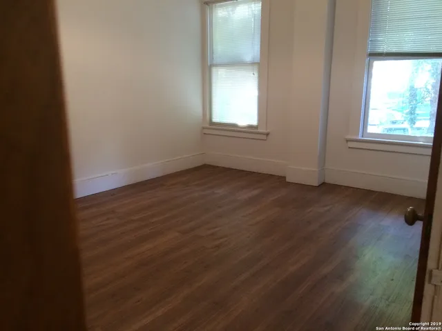 a bathroom with a sink a bathtub and a shower