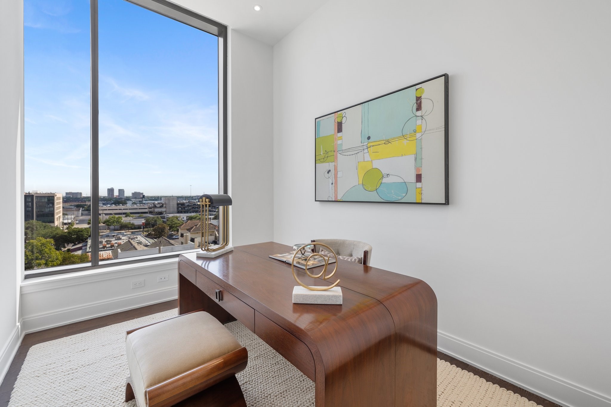 2323 West Main Street, Unit 703 Houston, TX 77098 - Photo 13 of 24 a dining room with furniture and a floor to ceiling window