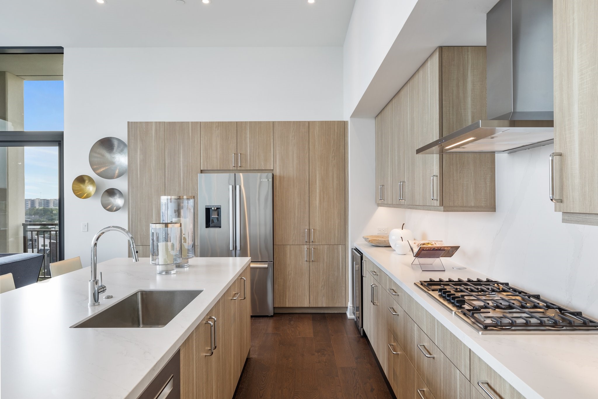 2323 West Main Street, Unit 703 Houston, TX 77098 - Photo 5 of 24 a kitchen with stainless steel appliances a sink stove and cabinets