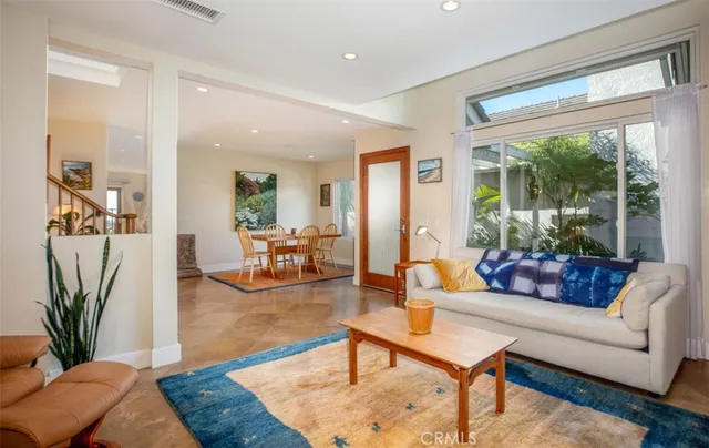 a living room with furniture and a table