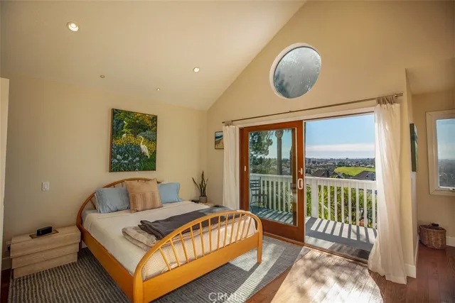 a view of a dining room with furniture and a window