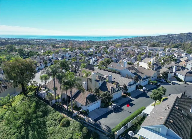 a view of ocean and mountains