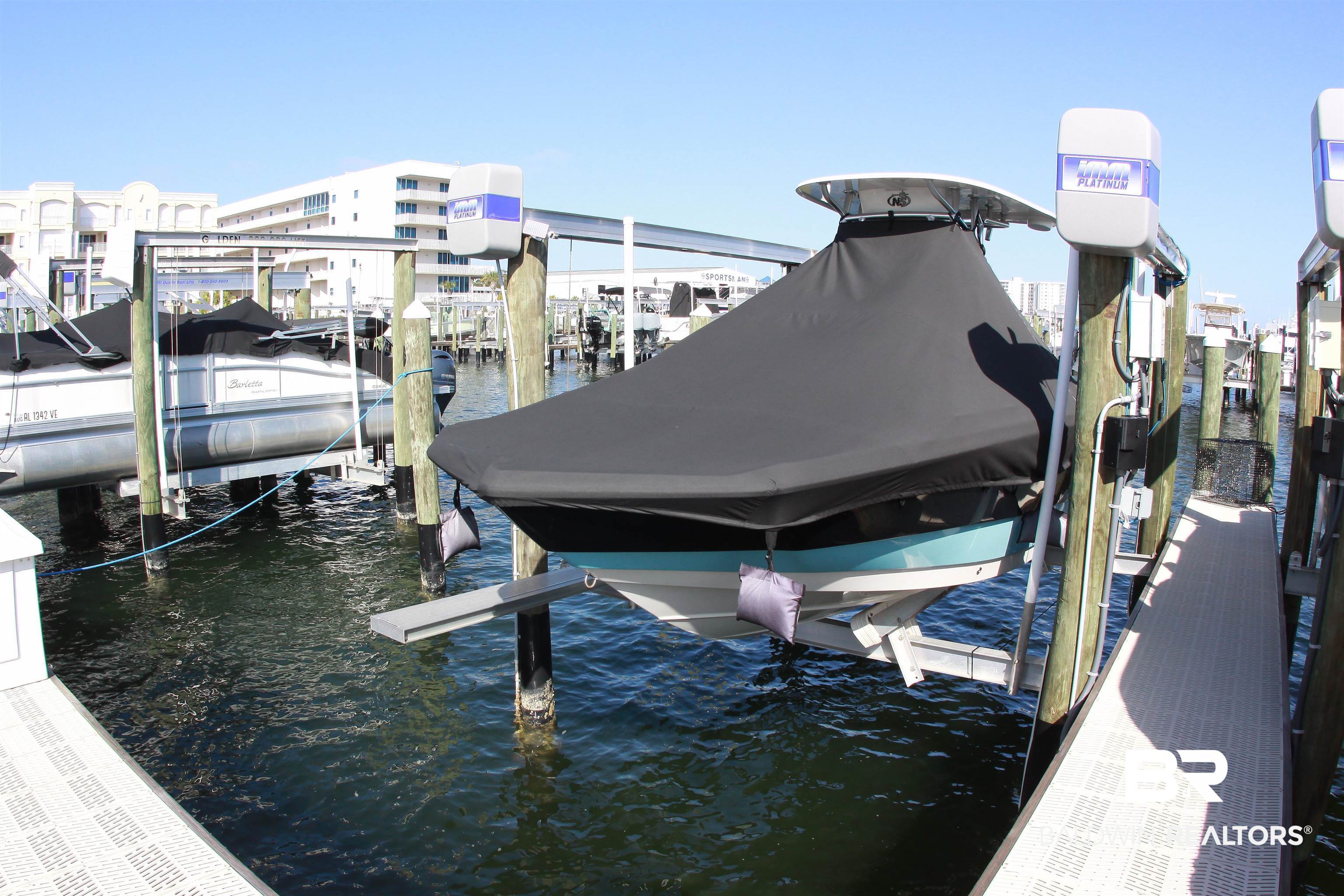 27770 Canal Road, Unit 308 Orange Beach, AL 36561 - Photo 12 of 16 Dock featuring boat lift and a water view