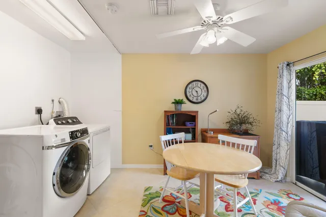 a sign that is on a brick wall