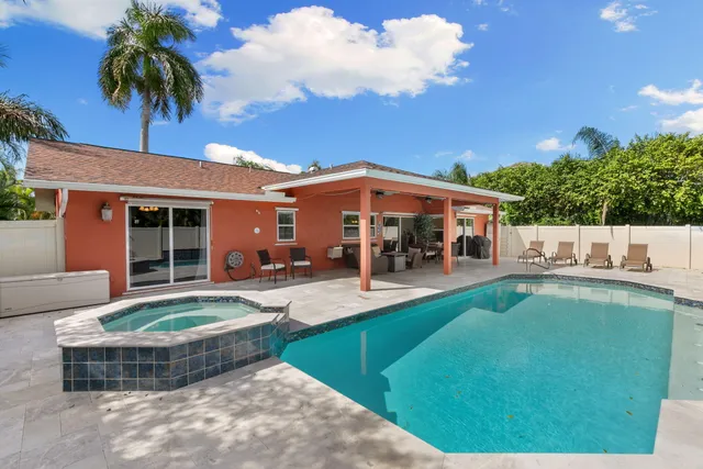 an aerial view of a house with a garden