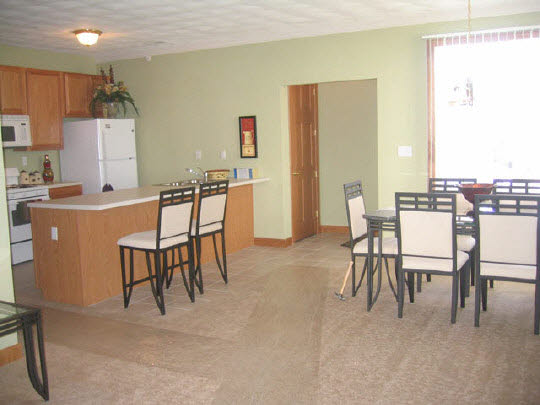 10372 Marblewing Road Roscoe, IL 61073 - Photo 3 of 7 a view of a dining room with furniture
