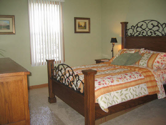 10372 Marblewing Road Roscoe, IL 61073 - Photo 6 of 7 a bedroom with a bed and a window