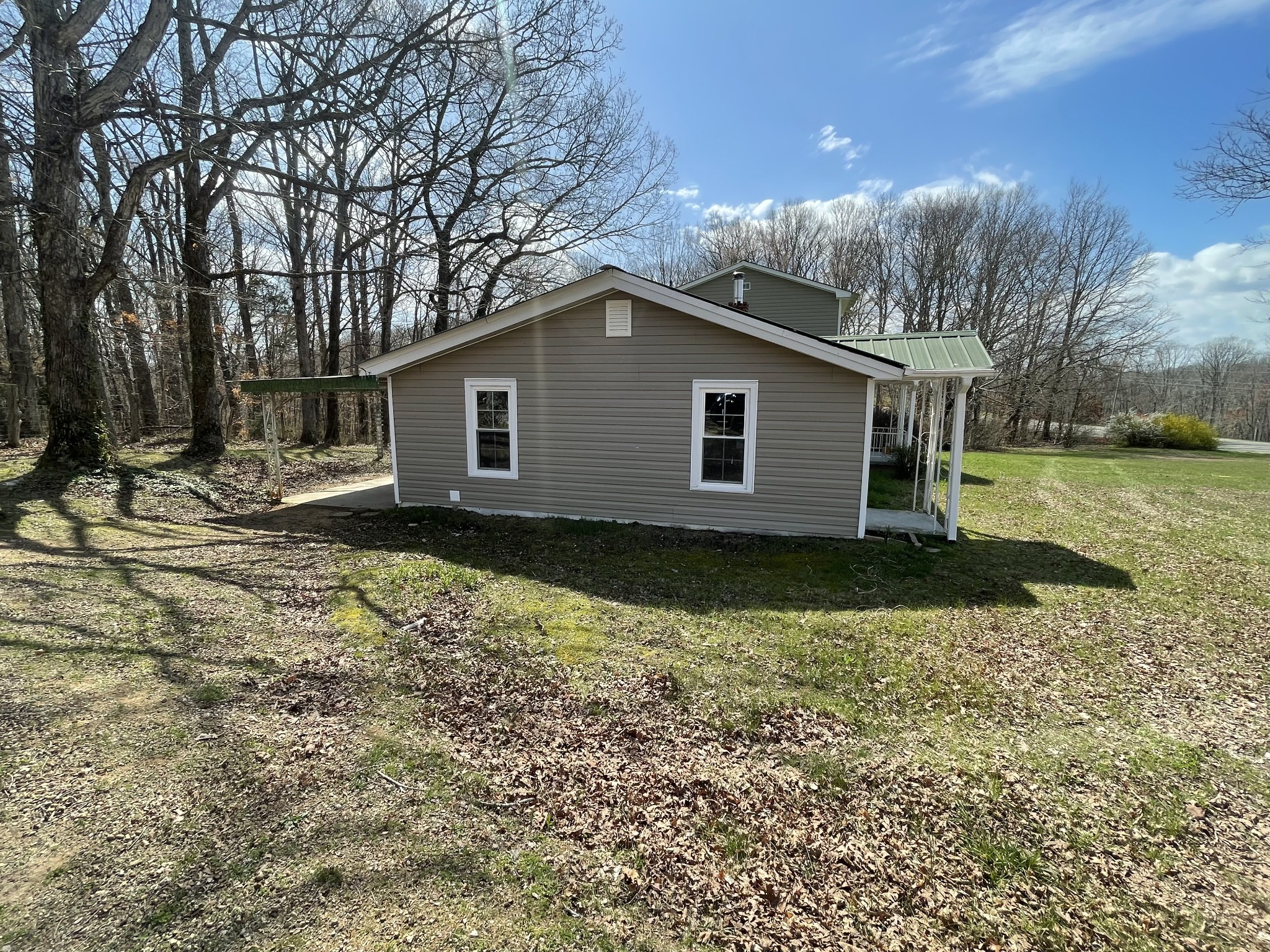 1808 Grays Bend Road Centerville, TN 37033 - Photo 4 of 18 a house view with a backyard space