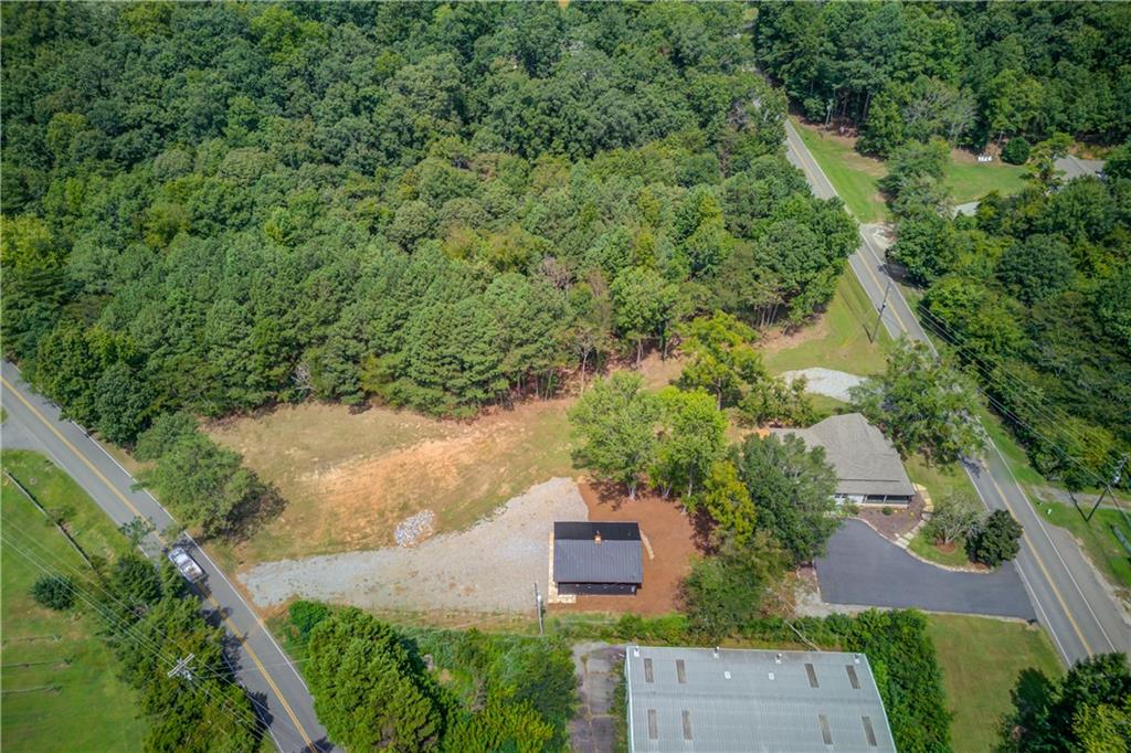 6700 Shady Grove Road Cumming, GA 30041 - Photo 22 of 69 an aerial view of a house with a yard