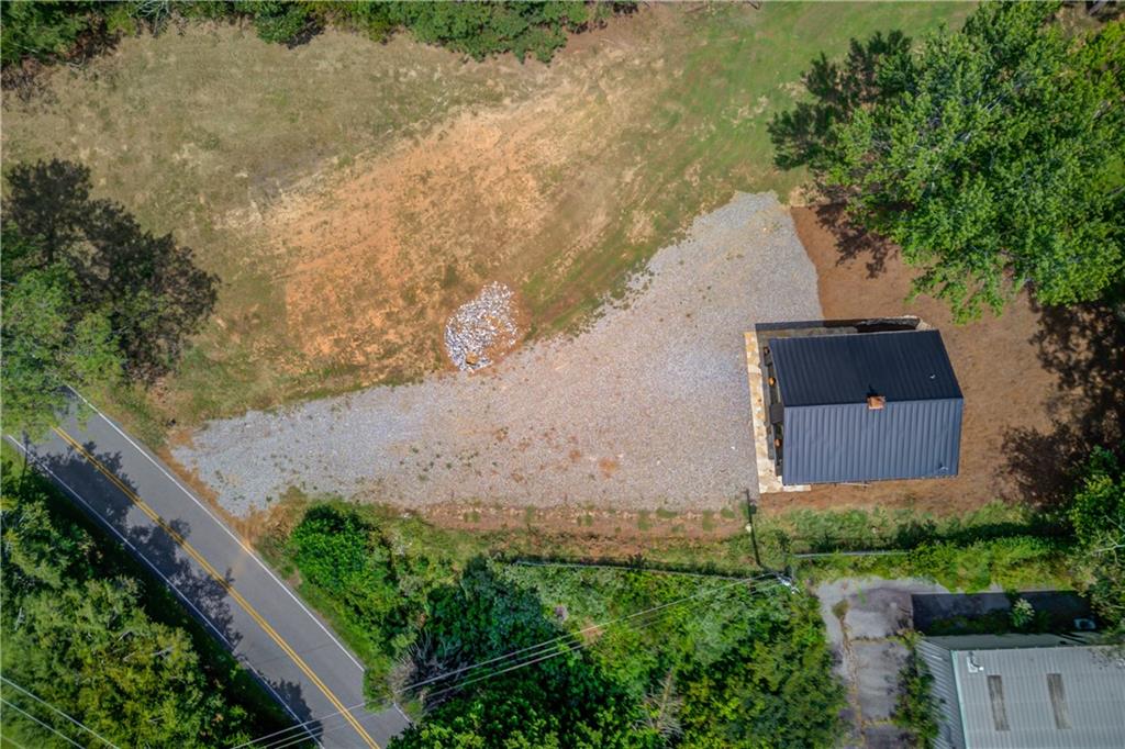 6700 Shady Grove Road Cumming, GA 30041 - Photo 57 of 69 an aerial view of a house with a yard